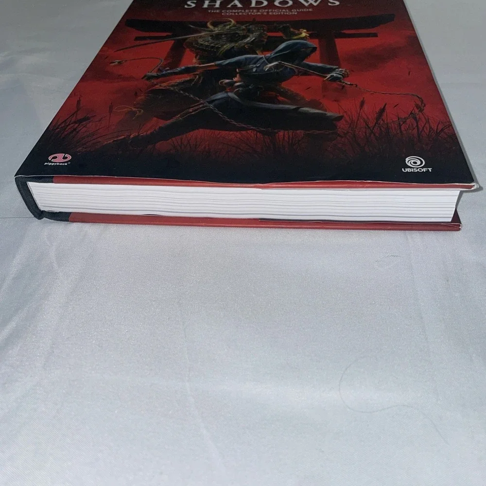Assassins Creed Shadows Official Guide Collectors Edition Piggyback Hardcover